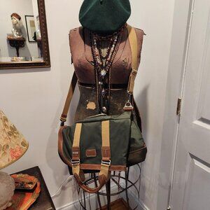 TUMI canvas and leather travel bag